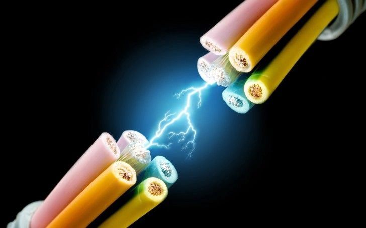 Electricity arcing between two groups of exposed wires.